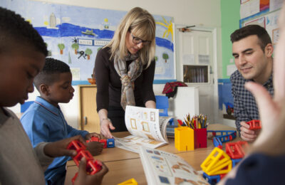 Classroom with teacher, therapists and children