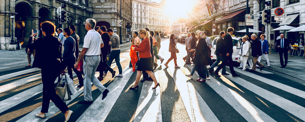 Groups of people crossing a road