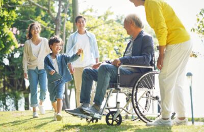 A family visiting an elderly relative.