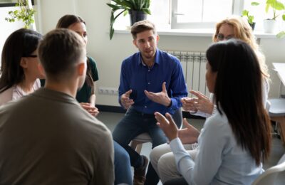 A group of adults in discussion.