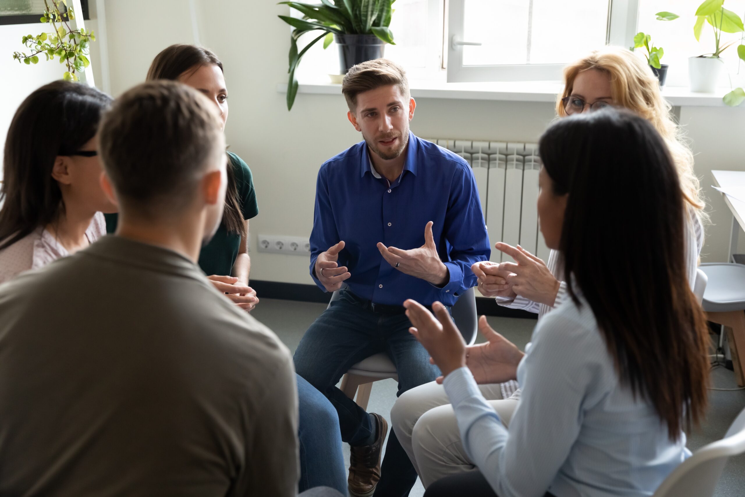 A group of adults in discussion.