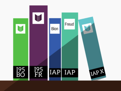 Bookshelf displaying five books with Bliss classification shelfmarks