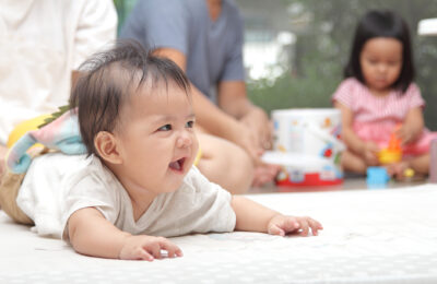 Cute smile and innocent bright eyes of Asian little children.