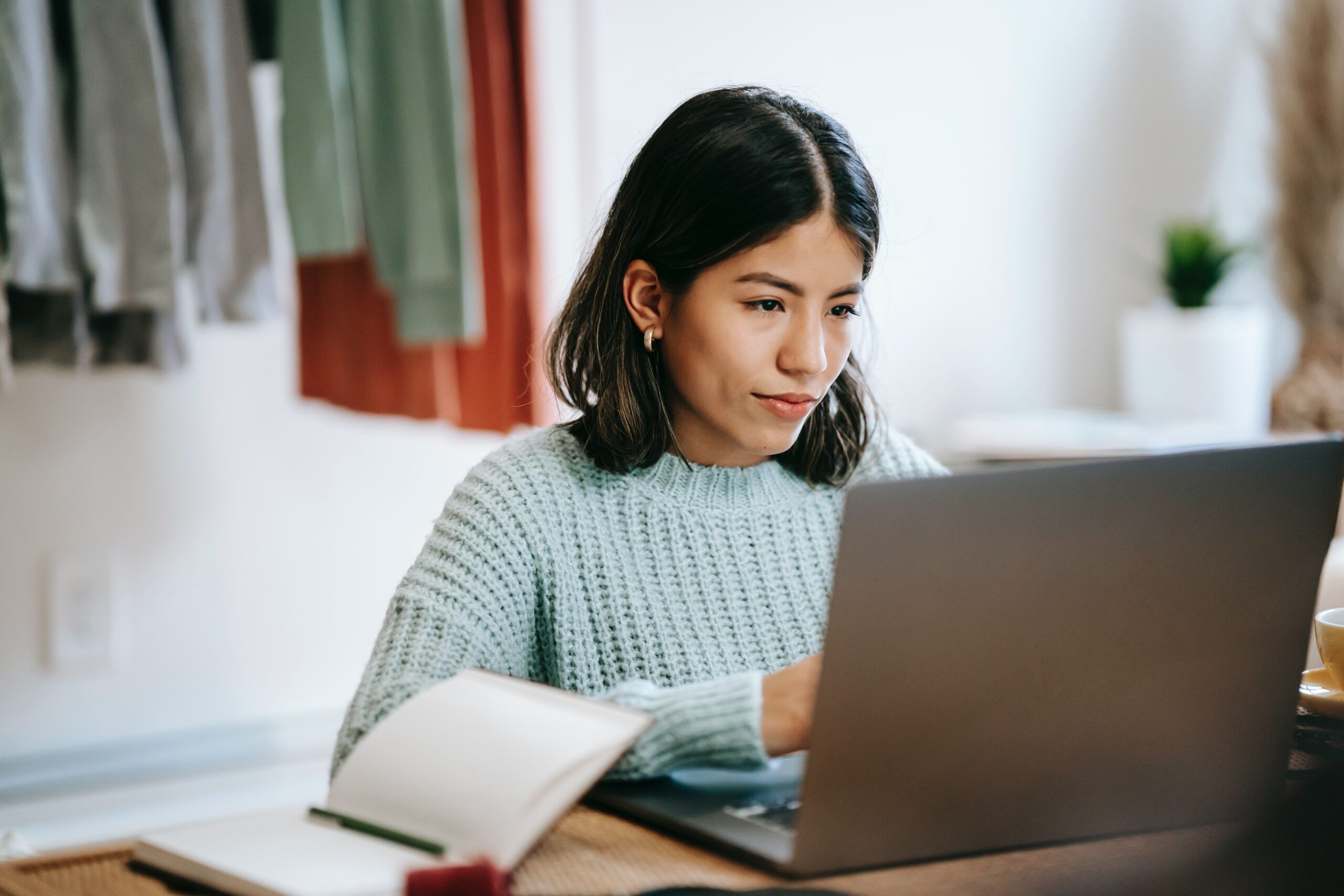 Woman looking at her laptop
