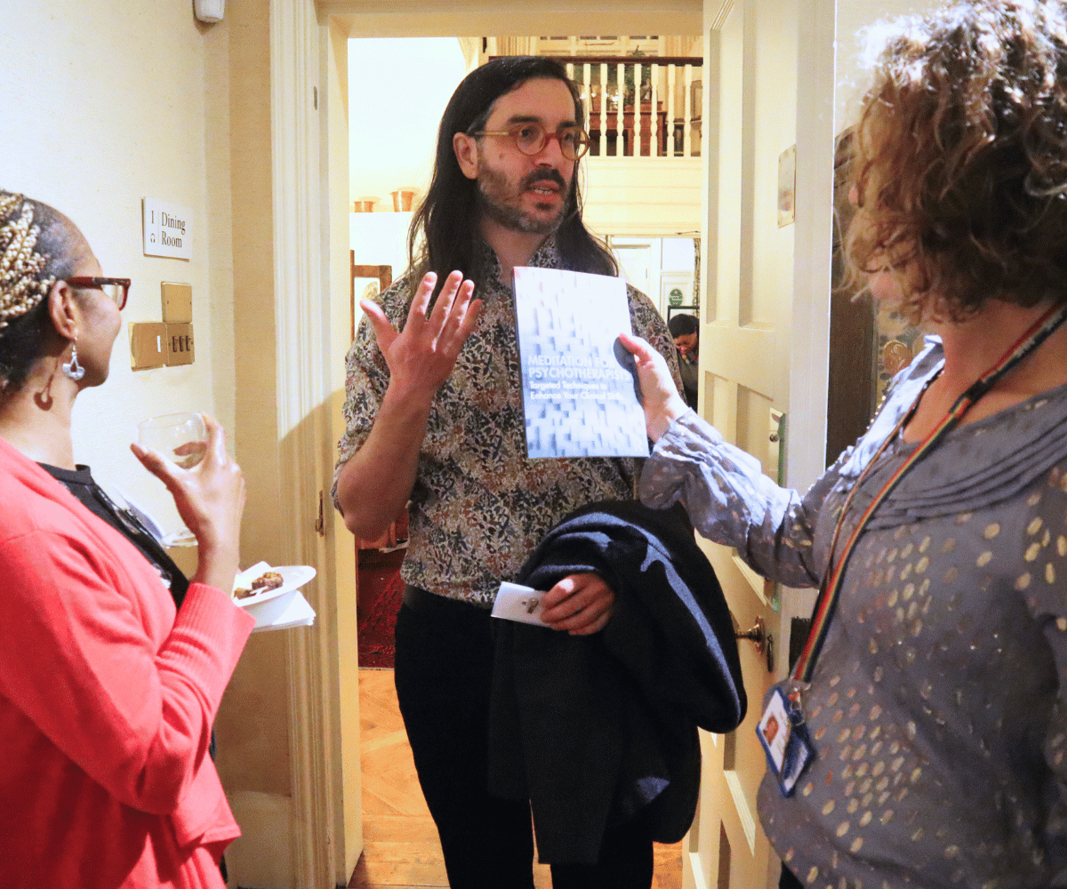 Group of three guests at alumni event