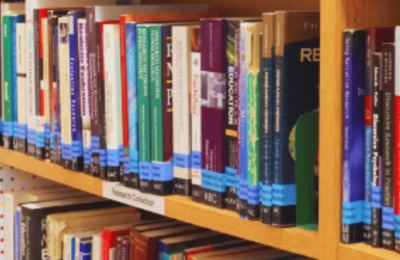 Bookshelf with research textbooks