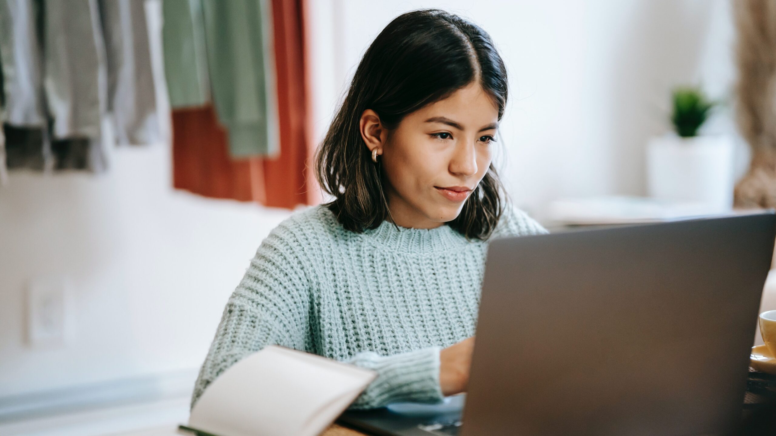 Woman looking at her laptop